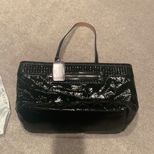 Coach black tote bag with pink interior